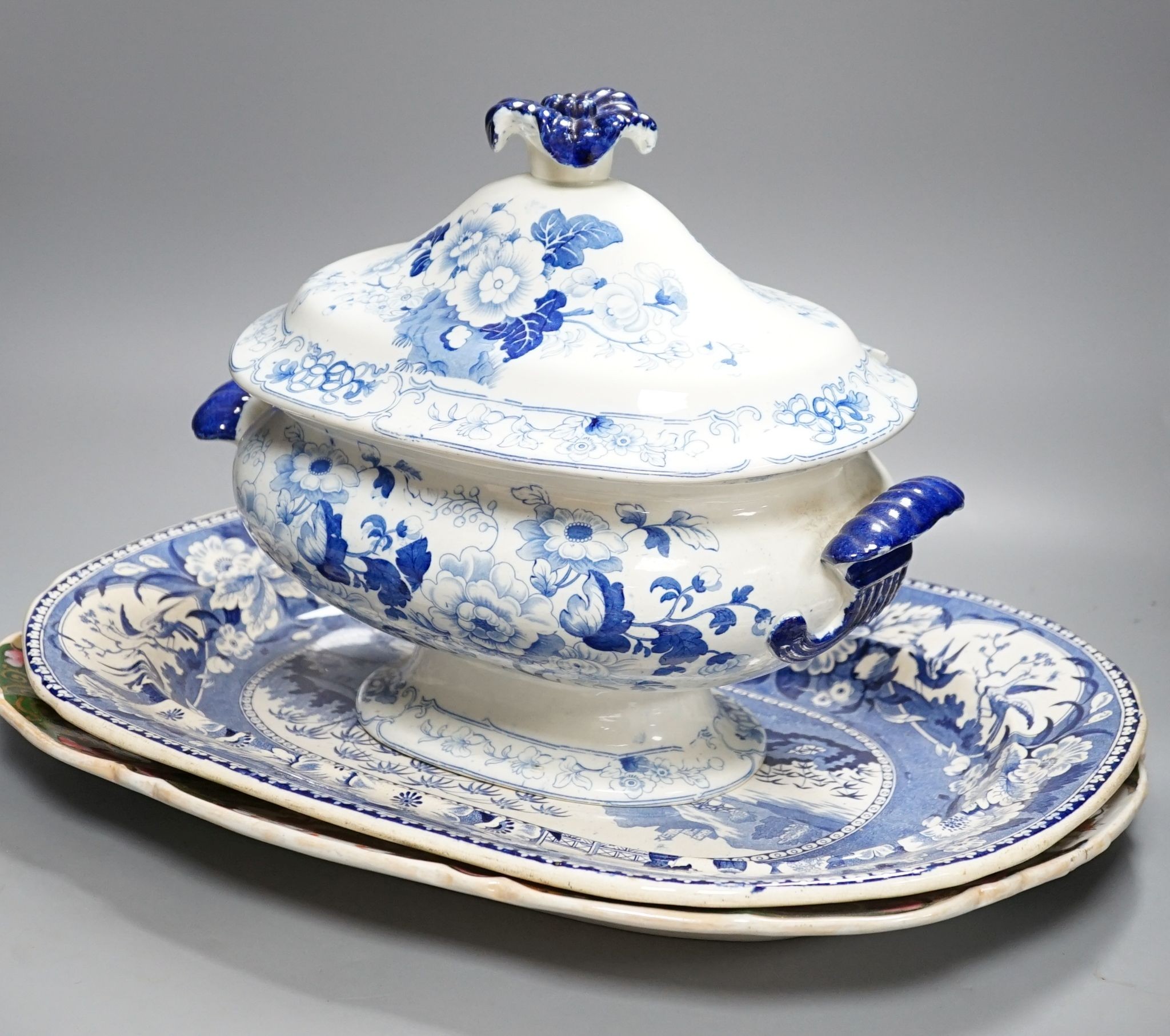 A Victorian Stone China soup tureen, 35cm wide, a Victorian blue-printed meat plate and a Masons Ironstone meat plate